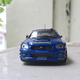 Illustration for article titled 1:43 Subaru Impreza WRC 2003 champion